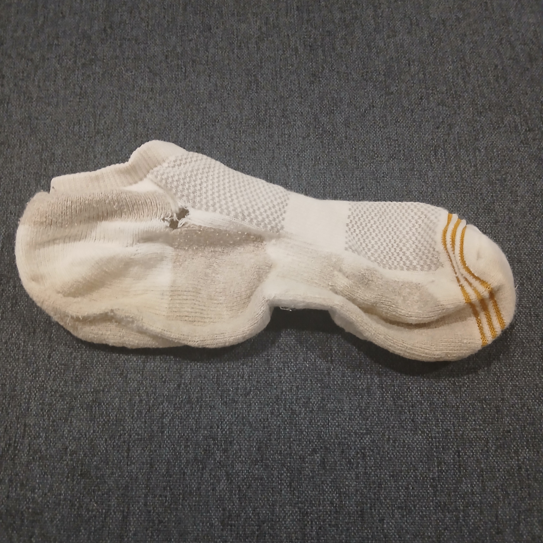Mailed Very Old White Socks With Holes And Staines Soles